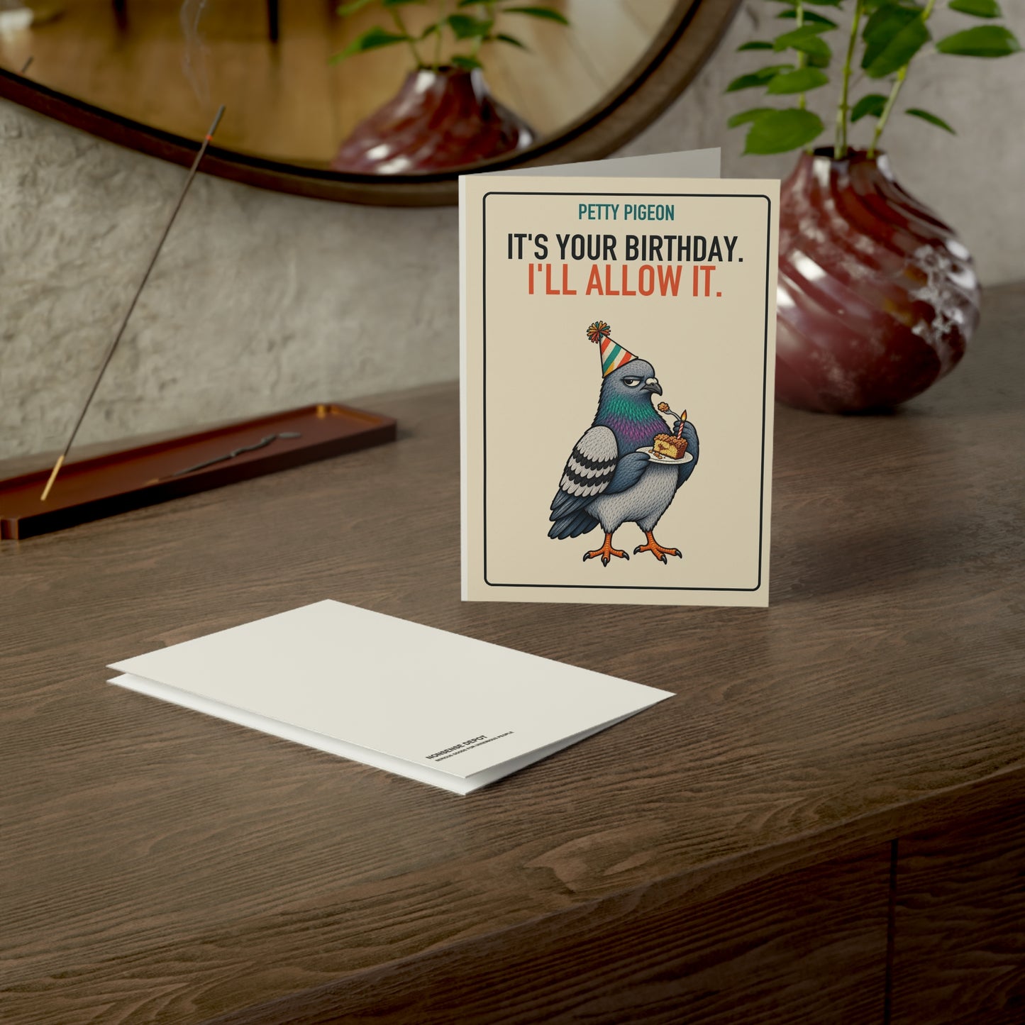 I’ll Allow It Pigeon Birthday Card, card and envelope in a tabletop scene