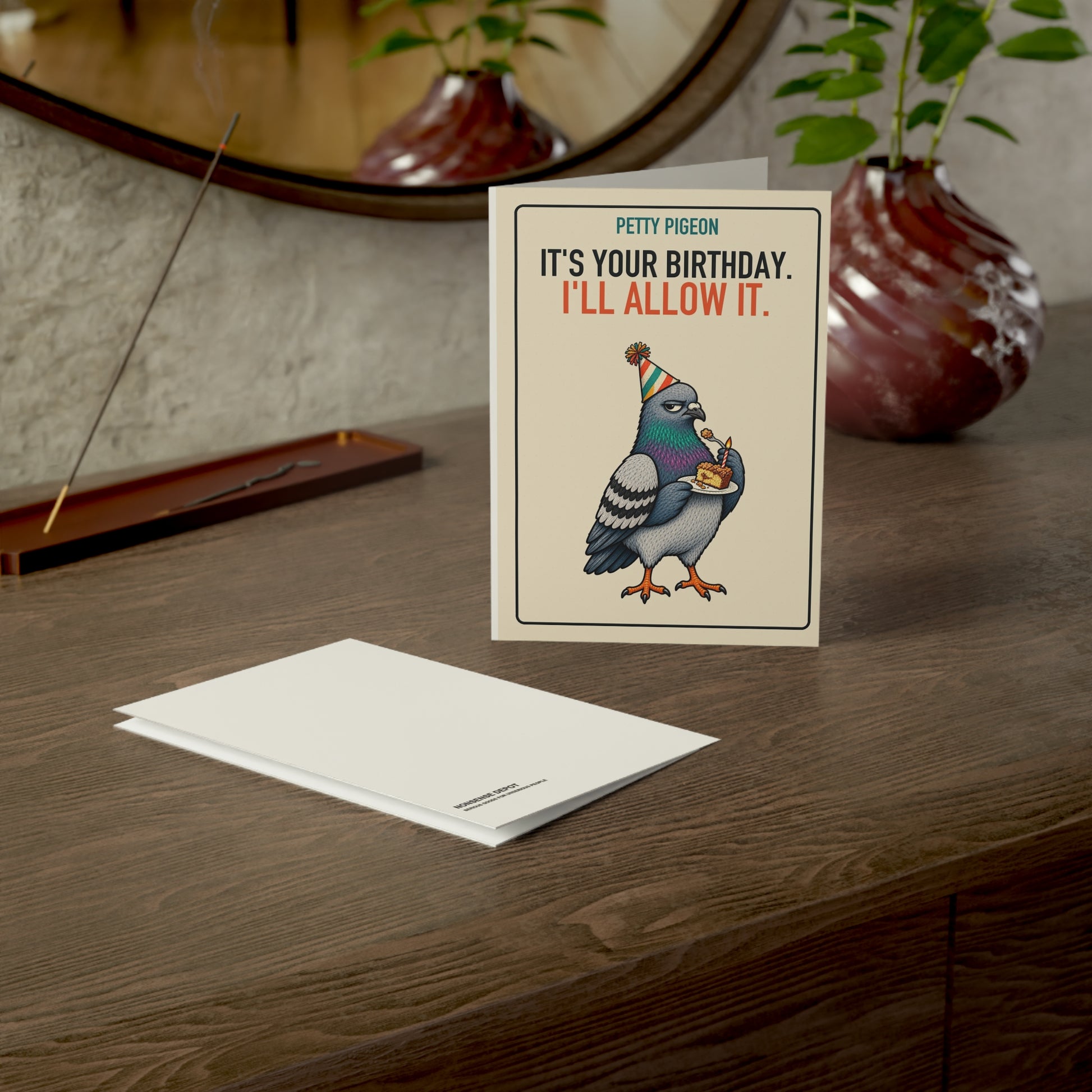 I’ll Allow It Pigeon Birthday Card, card and envelope in a tabletop scene