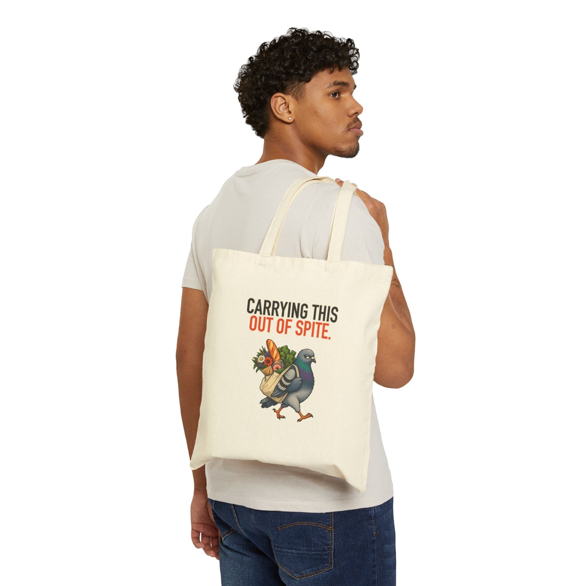 Carrying This Out of Spite Tote, natural canvas tote worn over the shoulder