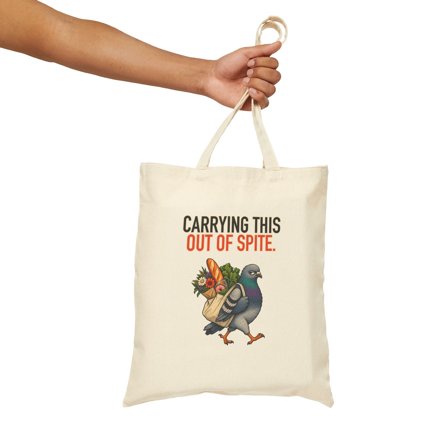 Carrying This Out of Spite Tote, natural canvas tote held by the handles