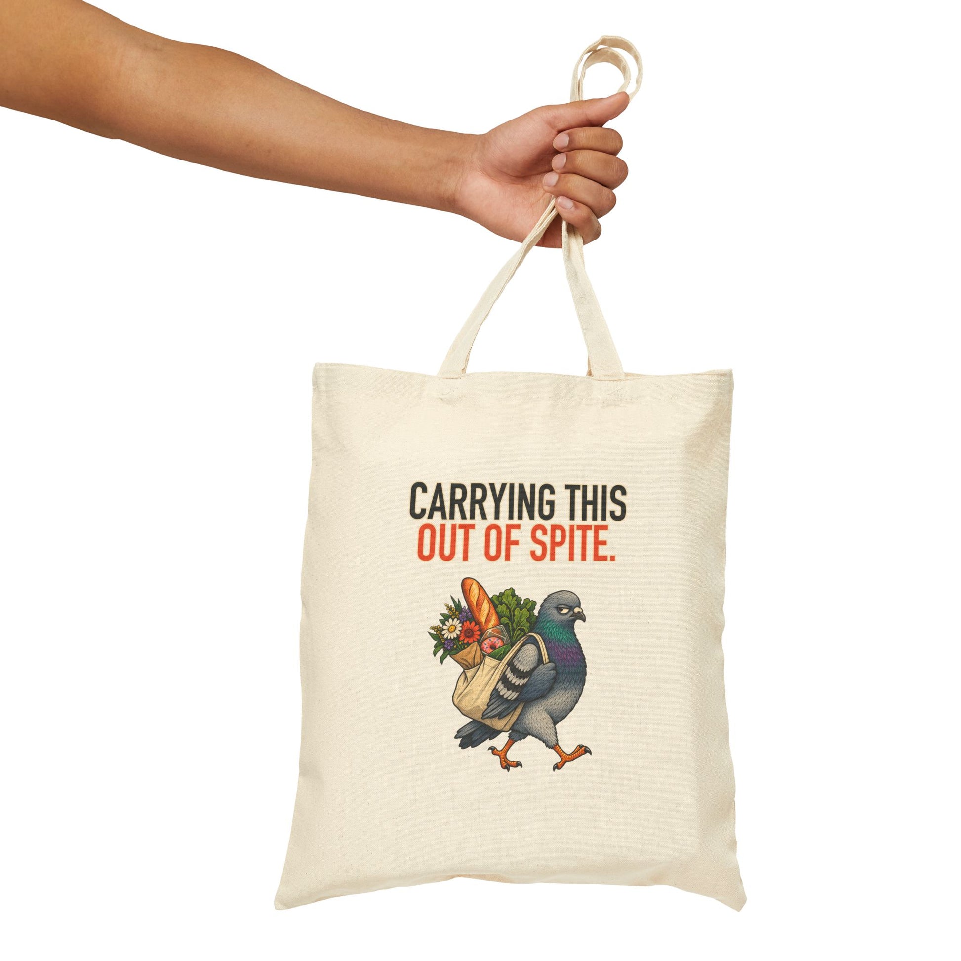 Carrying This Out of Spite Tote, natural canvas tote held by the handles