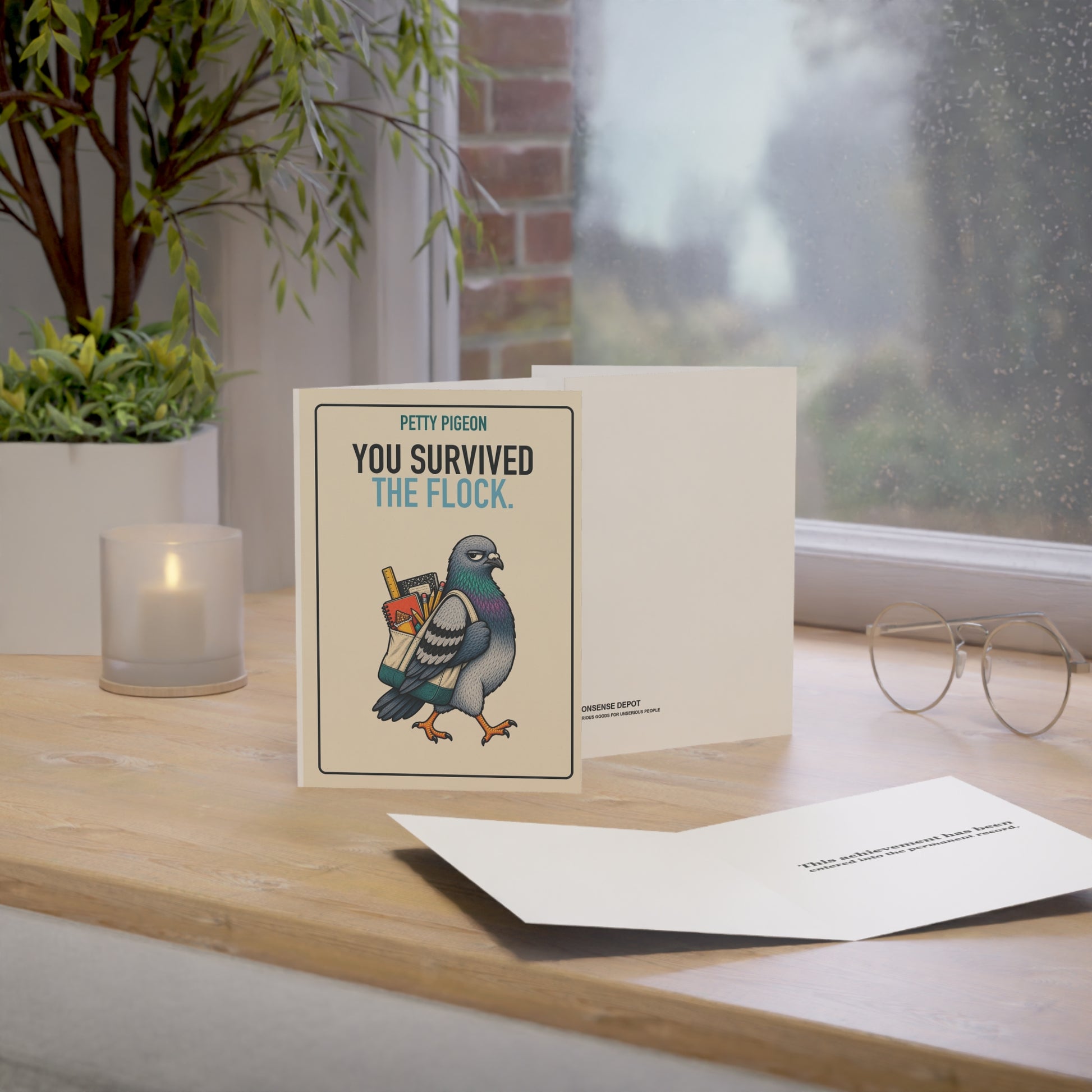 You Survived the Flock Teacher Card, upright card in a styled desk scene